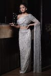 Mehul Gupta_Silver Net Hand Embroidery Sequins Asymmetric Neck Blouse With Skirt_at_Aza_Fashions