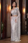 Buy_Mehul Gupta_Silver Net Hand Embroidery Sequins Asymmetric Neck Blouse With Skirt