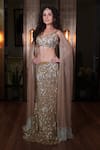 Buy_Mehul Gupta_Gold Net And Lycra Hand Embroidery Sequins Trellis Fish Cut Lehenga With Blouse _at_Aza_Fashions