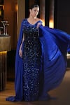 Mehul Gupta_Blue Net And Satin Silk Hand Embroidery Reflecting Stones Sequin Trail Gown _at_Aza_Fashions