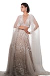 Mehul Gupta_Ivory Net Embroidery Cutdana Plunging V Persian Garden Bridal Cape Lehenga Set_Online_at_Aza_Fashions