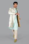 Gaurav Katta_White Italian Cotton Embroidered Thread Floral Open Sherwani Pant Set _at_Aza_Fashions