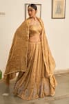 Buy_Apeksha Jain Label_Gold Tissue Hand Embroidery Zardozi Sweetheart Neck Lehenga Set _at_Aza_Fashions