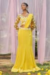 Buy_Megha Pitti_Yellow Georgette Embroidered Sequin V Neck Floral Pre-draped Saree With Blouse _at_Aza_Fashions