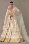 Buy_Masaba_Ivory Lehenga And Blouse Raw Silk Embellished Anar Phool Embroidered Bridal Set _at_Aza_Fashions