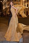 Seema Gujral_Gold Net Embroidered Pearls Plunged V Neck Gown  _at_Aza_Fashions