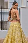 Seema Gujral_Yellow Net Embroidered 3d Florals Plunged Leaf Lehenga Set _Online_at_Aza_Fashions