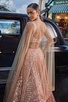 Shop_Seema Gujral_Peach Net Embroidered Sequins Sweetheart Bridal Lehenga Set 