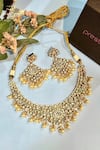 Buy_Prestones_White Kundan Studded Pearl Tassel Necklace Set_at_Aza_Fashions
