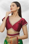 Samyukta Singhania_Maroon Silk Embroidery V-neck Cutout Blouse _at_Aza_Fashions