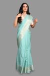 Buy_Zal From Benaras_Green Pure Silk Hand Floral Woven Hem Saree With Unstitched Blouse Piece _at_Aza_Fashions