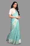 Shop_Zal From Benaras_Green Pure Silk Hand Floral Woven Hem Saree With Unstitched Blouse Piece _Online_at_Aza_Fashions