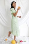 Shop_Bohobi_Green Cotton Printed Lime V-neck Melody Slit Dress _at_Aza_Fashions