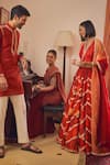 Isha Gupta Tayal_Red Georgette Printed Bandhani V Neck Tara Pre-draped Saree Set _Online_at_Aza_Fashions