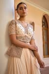 Isha Gupta Tayal_White Saree Georgette Ambar Pre-draped Lehenga With Jacket _at_Aza_Fashions