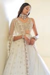 Buy_Foram Patel_Cream Organza Embroidered Mirror V Neck Blouse Flared Lehenga Set _Online_at_Aza_Fashions