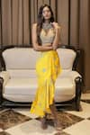 Buy_Foram Patel_Yellow Georgette Embroidered Shell Cowrie Bralette And Draped Skirt Set _at_Aza_Fashions