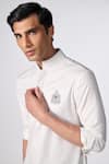 Buy_S&N by Shantnu Nikhil_Off White Poly Blend Crest Embroidered Short Kurta _Online_at_Aza_Fashions