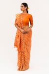 Buy_Naina Jain_Orange Tissue Raw Silk Embroidery Mirror Luni Leheriya Saree With Work Blouse _at_Aza_Fashions