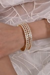 SHLOK JEWELS_White Stone Embellished Cutwork Bangles - Set Of 2 _Online_at_Aza_Fashions