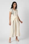 Shop_KAVERI_Off White 100% Linen Printed Brick V Neck Placement Jumpsuit  _Online_at_Aza_Fashions