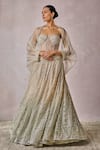 Shop_Tarun Tahiliani_Ivory Bustier Soft Net Embroidery Swarovski Cape Shirt Open Lehenga Set _Online_at_Aza_Fashions