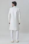 Shop Arihant Rai Sinha Off White Silk Sequins Flower Artwork Embroidered Sherwani With Churidar at Aza Fashions Shop_Arihant Rai Sinha_Off White Silk Sequins Flower Artwork Embroidered Sherwani With Churidar _at_Aza_Fashions