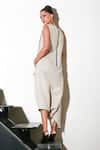 Shop_Echke_White Linen Solid Asymmetric Neck Jumpsuit _at_Aza_Fashions