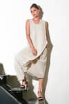 Buy_Echke_White Linen Solid Asymmetric Neck Jumpsuit _Online_at_Aza_Fashions