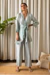 Buy_Kapraaaha_Blue Top Muslin Embroidered Thread V Neck Floral Tie-up And Pant Set _at_Aza_Fashions