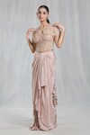 Buy_Samyukta Singhania_Gold Corset And Cape Net Embellished Bead Cape Sequin Sheer Poncho Skirt Set_at_Aza_Fashions