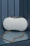 Buy_The Tan Clan_White Hand Embroidery Pearl Clutch_at_Aza_Fashions