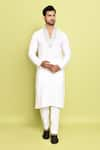 Buy_Arihant Rai Sinha_Off White Cotton Hand Embroidered Neck Kurta With Pant _at_Aza_Fashions