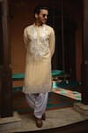 Buy_Ankit V Kapoor_Off White Silk Chanderi Embroidered Mirror Juna Mahal Work Kurta And Salwar Set_at_Aza_Fashions