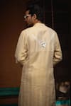 Shop_Ankit V Kapoor_Off White Silk Chanderi Embroidered Mirror Juna Mahal Work Kurta And Salwar Set_at_Aza_Fashions