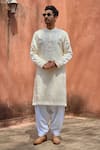 Buy_Ankit V Kapoor_Ivory Viscose Silk Linen Embroidered Roopangarh Paisley Kurta And Salwar Set_at_Aza_Fashions