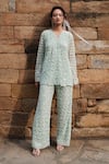 Buy_Kashmiraa_Green Net Embroidered Sequin V-neck Scallop Kurta With Pant_at_Aza_Fashions