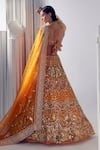 Ruchika Hurria_Orange Net Embroidered Pearl Plunge Neck Sequin Lehenga Set _Online_at_Aza_Fashions