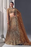 Buy_Ruchika Hurria_Gold Net Embroidered Sequin Leaf Neck Tassel Detailed Lehenga Blouse Set _at_Aza_Fashions