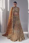 Ruchika Hurria_Gold Net Embroidered Sequin Leaf Neck Tassel Detailed Lehenga Blouse Set _Online_at_Aza_Fashions