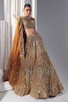 Buy_Ruchika Hurria_Gold Net Embroidered Sequin Leaf Neck Tassel Detailed Lehenga Blouse Set _Online_at_Aza_Fashions