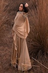 Shop_Kaprapan by Anaita Shah_Beige Satin Chiffon Embroidered Sequin Round Jumpsuit With Cape _at_Aza_Fashions