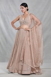 Buy_Samyukta Singhania_Beige Silk Embroidery Sequin Halter Neck Peony Bloom Lehenga Set_at_Aza_Fashions