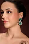 Buy_joules by radhika_Green Stone Chromatic Tear Drop Carved Earrings _at_Aza_Fashions