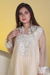 Shop_Sunita Nagi_Beige Organza Embroidered Mirror Notched Floral Thread And Top Pant Set _at_Aza_Fashions