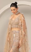 Shop_Sidhaarth & Disha_Gold Net Hand Embroidery Crystals Blouse Sequin Cape Fish Cut Skirt Set _at_Aza_Fashions