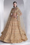 Buy_Ruchika Hurria_Gold Net Embroidered Swarovski Plunge V Bridal Lehenga Set_at_Aza_Fashions