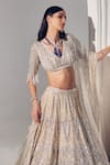 Shop_Ruchika Hurria_Ivory Net Embroidered Sequin V Neck Bridal Lehenga Set _Online_at_Aza_Fashions