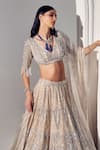 Shop_Ruchika Hurria_Ivory Net Embroidered Sequin V Neck Bridal Lehenga Set _at_Aza_Fashions