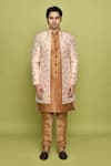 Aryavir Malhotra_Peach Sherwani Brocade Flower Pattern Churidar Set _at_Aza_Fashions